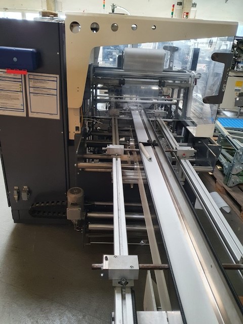 Taktende Folienverpackungsmaschine, Beck mit Zusatzdrucker lagertechnik