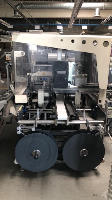 Taktende Folienverpackungsmaschine, Beck mit Zusatzdrucker lagertechnik