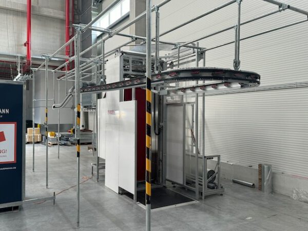 Vollautom. Verpackungsmaschine für Hängetextilien, Polypack -Vollautomat, Typ 40 inkl. Zuführstrecke
