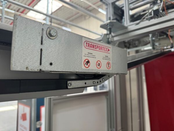 Vollautom. Verpackungsmaschine für Hängetextilien, Polypack -Vollautomat, Typ 40 inkl. Zuführstrecke – Bild 10