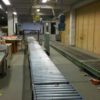 Packstraße mit unangetriebener Fördertechnik, integrierte Waage, eine Umreifungsmaschine und Druckvorrichtung – gebraucht - : – Bild 2