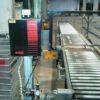 Packstraße mit unangetriebener Fördertechnik, integrierte Waage, eine Umreifungsmaschine und Druckvorrichtung – gebraucht - : – Bild 4