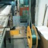Packstraße mit unangetriebener Fördertechnik, integrierte Waage, eine Umreifungsmaschine und Druckvorrichtung – gebraucht - : – Bild 10